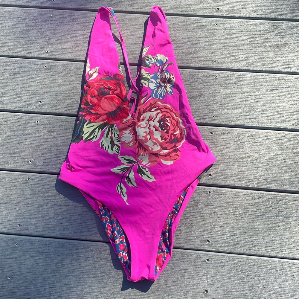 One piece high cut swimsuit includes original garment bag